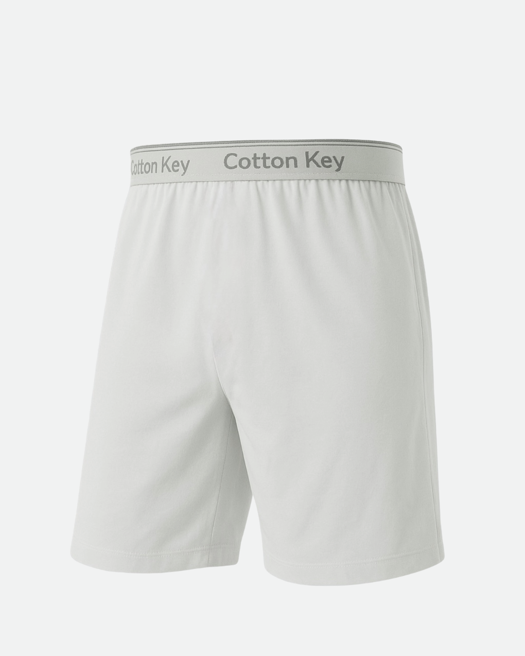 Flat lay of men’s white cotton boxer shorts long cut – breathable cotton underwear for kandora and everyday wear by Cotton Key