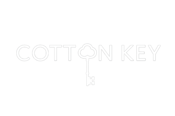 Cotton Key logo in white with transparent background